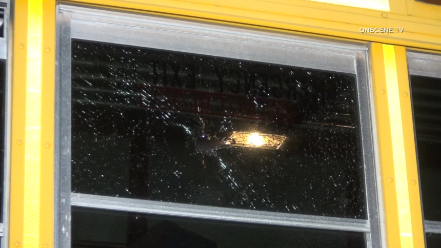 bus hit by projectile