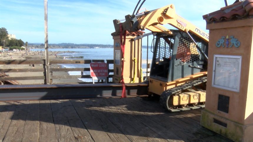 Crews bring in support beam on Capitola Wharf