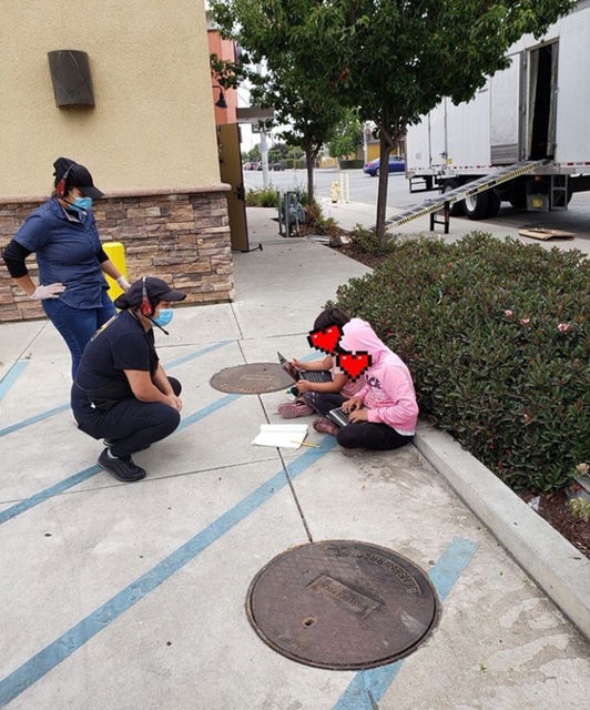 kids working outside taco bell