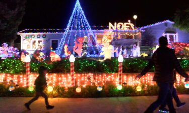 Marina residents celebrating Christmas with holiday lights