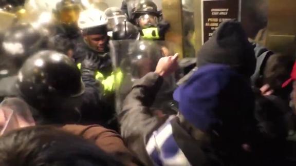 Disturbing Video Shows Officer Crushed Against Door By Mob Storming The ...