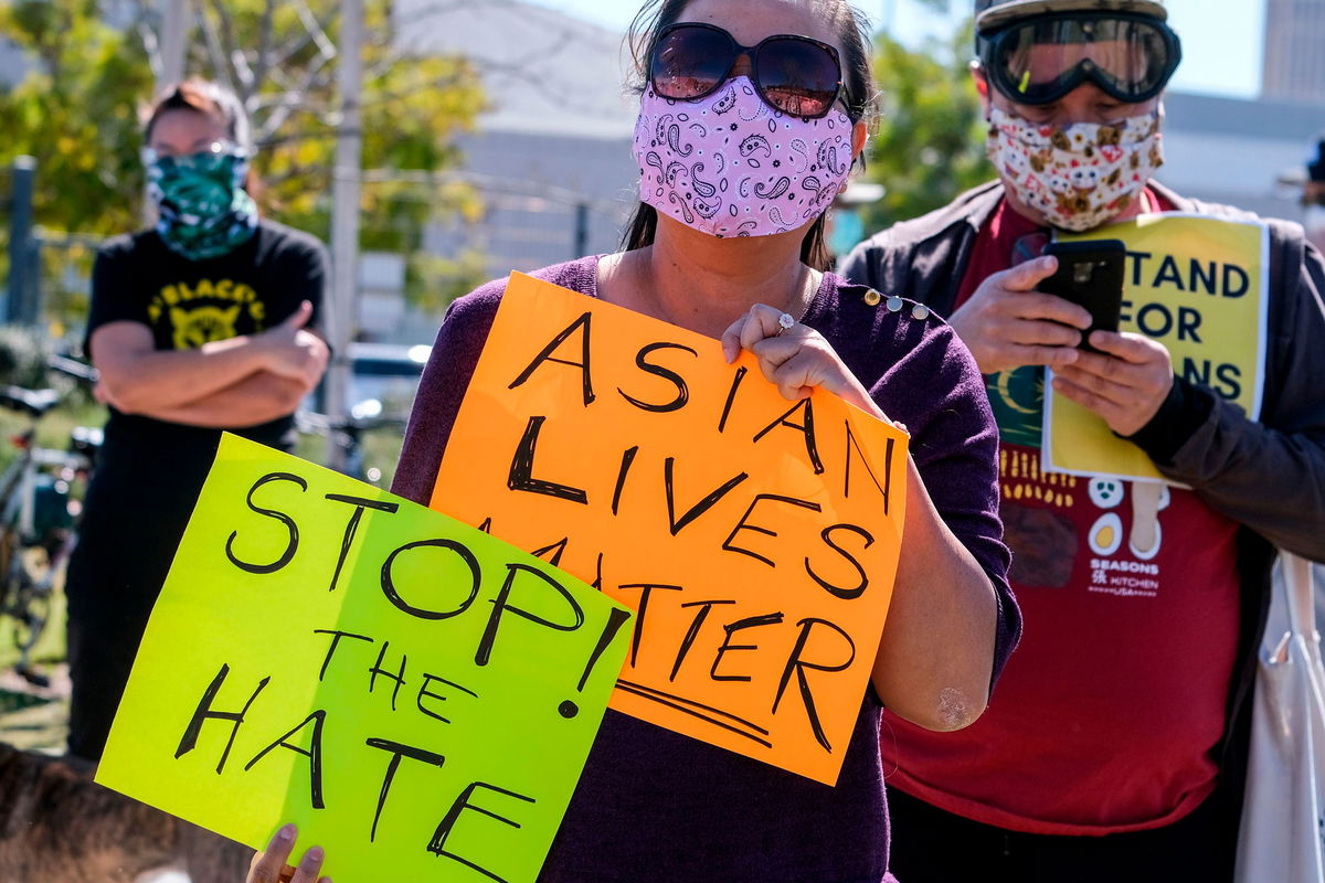 California Lawmakers allocated $1.4 million to help Asian Americans report hate incidents after a string of recent violent attacks. Demonstrators, in this image, take part in an anti-Asian violence rally in Los Angeles on February 20.