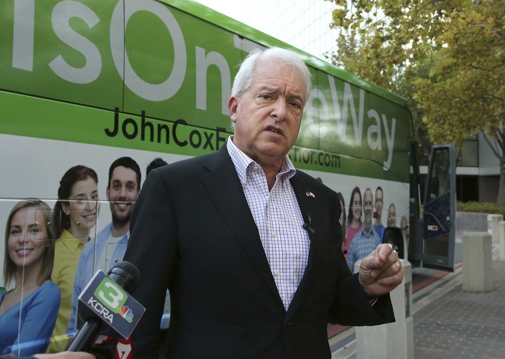 In this Nov. 1, 2018, file photo, Republican gubernatorial candidate John Cox talks to reporters before beginning a statewide bus tour in Sacramento, Calif. California Gov. Gavin Newsom is facing a possible recall election as the nation's most populous state struggles to emerge from the coronavirus crisis. Newsom's challenging year has already encouraged Republicans who have signaled they are likely candidates, including former San Diego Mayor Kevin Faulconer and Newsom's 2018 rival, businessman Cox.