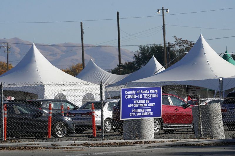  In this Dec. 1, 2020, file photo, cars line up at a County of Santa Clara COVID-19 testing site during the coronavirus pandemic in San Jose, Calif. Santa Clara County will not participate in Gov. Gavin Newsom's plan to have Blue Shield control COVID-19 vaccine distribution in California. County Executive Jeff Smith said Monday, March 8, 2021, that the county will not sign a contract with the health insurance company because it would not improve speed or efficiency, The Mercury News reported.