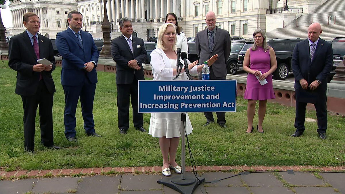 Lawmakers are seen April 29 announcing the new legislation targeting sexual assaults in the military.