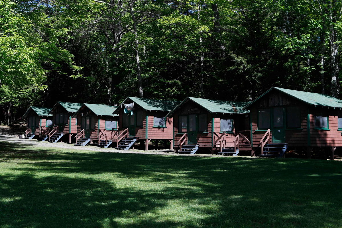 The US Centers for Disease Control and Prevention put out its new Covid-19 guidelines for camps on Friday. This Thursday, June 4, 2020 file photo shows a row of cabins at a summer camp in Fayette, Maine.