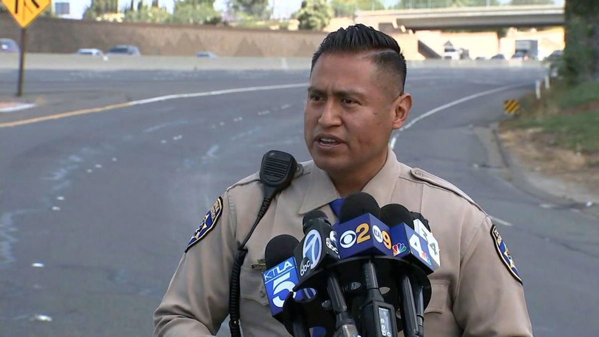 A 6-year-old boy was fatally shot Friday in a suspected road rage incident while sitting inside a car being driven by his mother. California Highway Patrol Officer Florentino Olivera answers questions from the news media about the road rage shooting that happened on the 55 Freeway in Orange County on Friday, May 21.