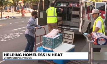 Union Gospel Mission members load a van with supplies for the homeless in Portland