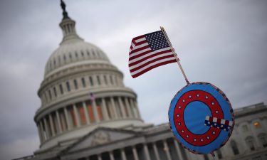 The FBI has warned lawmakers that online QAnon conspiracy theorists may carry out more acts of violence as they move from serving as "digital soldiers" to taking action in the real world following the January 6 US Capitol attack.