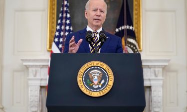 President Joe Biden speaks about reaching 300 million Covid-19 vaccination shots