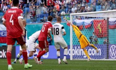 Aleksei Miranchuk of Russia scores their side's winner against Finland.