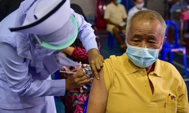 A nurse administers a dose of the AstraZeneca Covid-19 coronavirus vaccine at the Narathiwat Hospital compound in the southern province of Narathiwat on June 7.