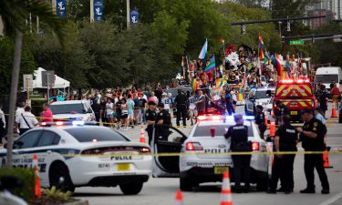 Police and firefighters respond after a truck drove into a crowd of people injuring them during The Stonewall Pride Parade and Street Festival in Wilton Manors