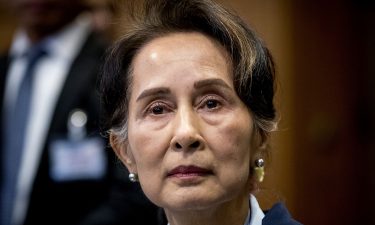 Myanmar's State Counselor Aung San Suu Kyi looks on before the UN's International Court of Justice on December 11