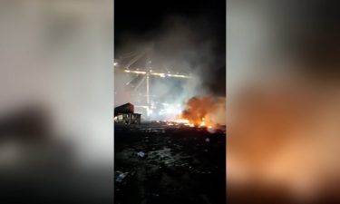 An explosion inside a container on a ship docked at Dubai's Jebel Ali port late Wednesday caused a large fire.