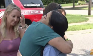 19-year-old Antonina Barry noticed flames coming from her neighbors' house and got three people and their dog out of their burning home
