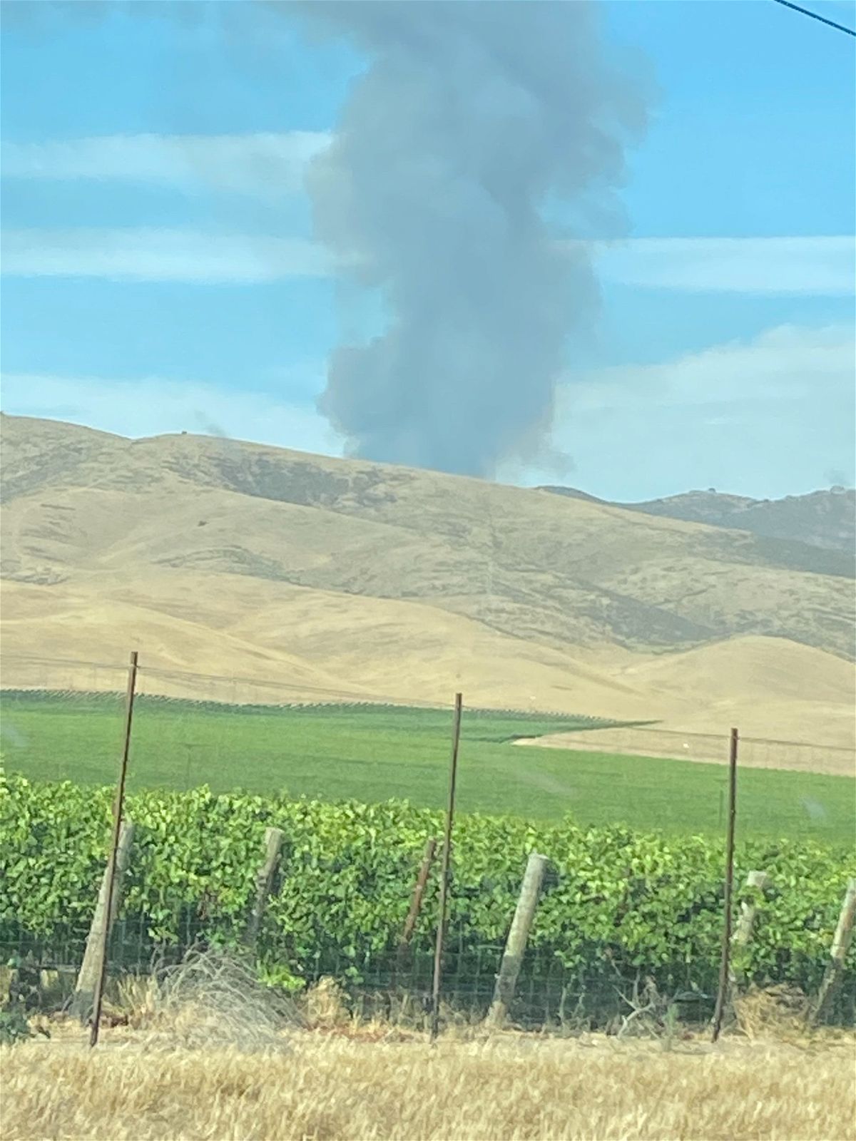 A photo shared with KION of a fire burning near Highway 146. Photo date 7/28/2021.