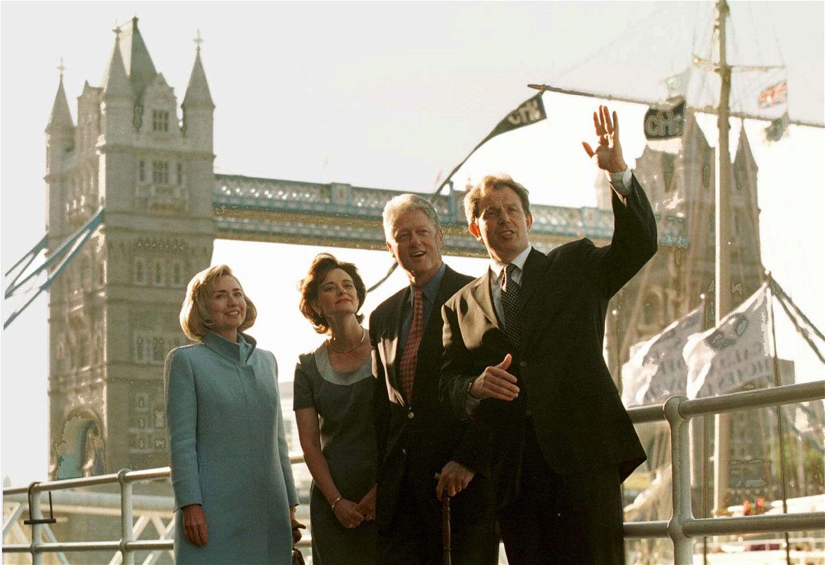 <i>Greg Gibson/AP</i><br/>US President Bill Clinton and his wife Hillary pose in front of London's Tower Bridge with British Prime Minister Tony Blair his wife Cherie