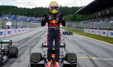 Max Verstappen celebrates after winning the Styrian Grand Prix.