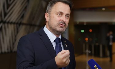Luxembourg's Xavier Bettel talks to journalists on the second day of an EU summit on June 25.