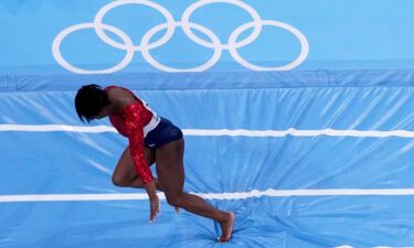 Simone Biles stumbles as she lands during the artistic gymnastics women's final at the 2020 Summer Olympics on Tuesday.