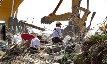 Rescue teams from Pennsylvania search the rubble of the Champlain Towers South on July 8.