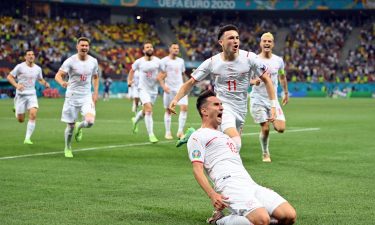 Switzerland's forward Mario Gavranovic celebrates scoring his team's late equalizing goal.