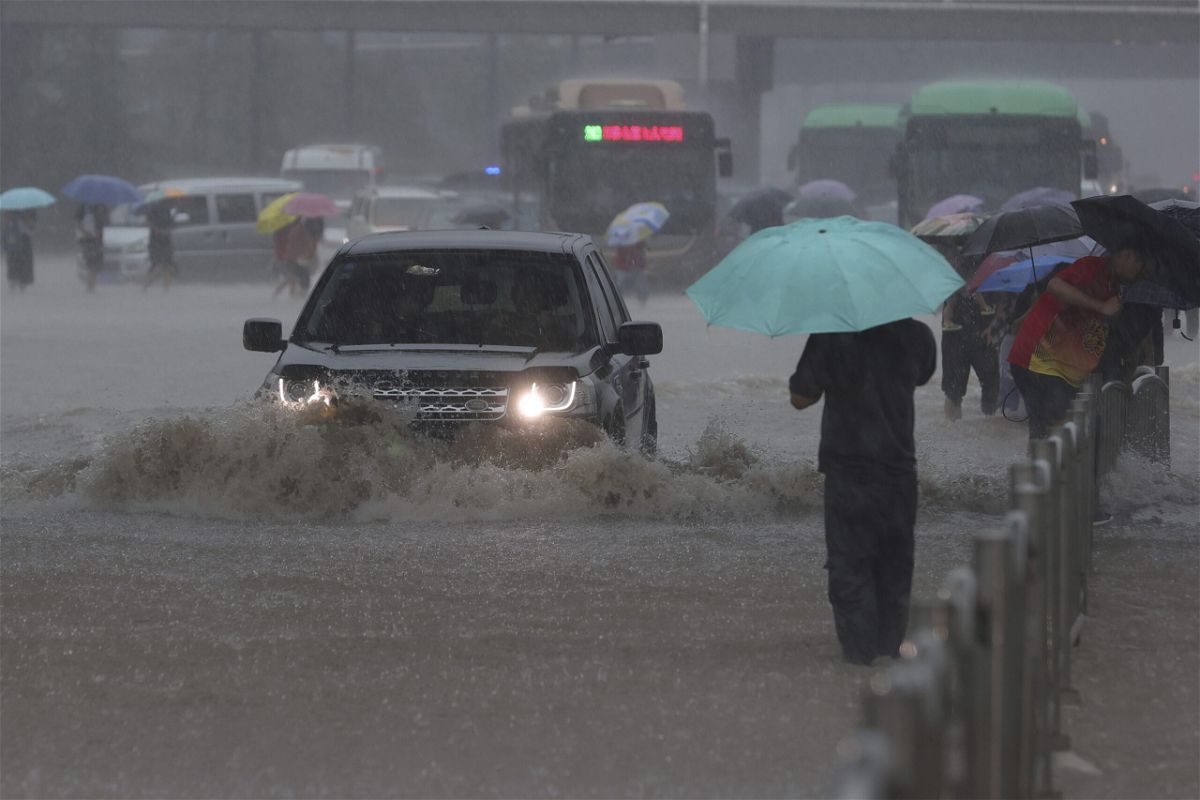 A heavy downpour is shown in Zhengzhou