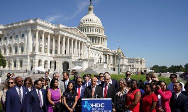 Representative Chris Turner joins other Democratic members of the Texas House of Representatives