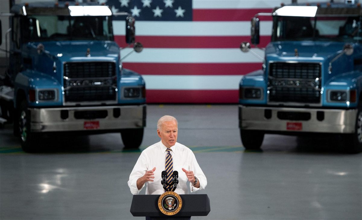 <i>SAUL LOEB/AFP/Getty Images</i><br/>US President Joe Biden speaks about American manufacturing and the American workforce after touring the Mack Trucks Lehigh Valley Operations Manufacturing Facility in Macungie