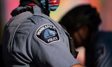 Officials on Friday approved the language of a ballot measure that will ask voters in November whether the city's police department should be replaced with public safety department.
