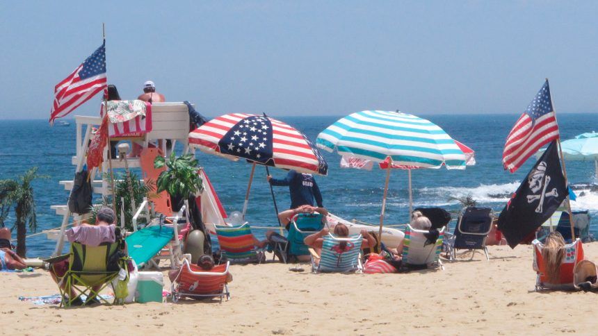 Flags line the beach in Belmar