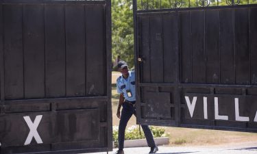 Guards guard the morgue where the body of President Jovenel Moise was being held on July 10.