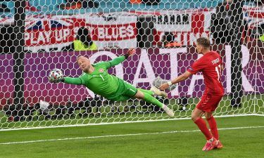 Kasper Schmeichel made some impressive saves to keep Denmark in the tie.