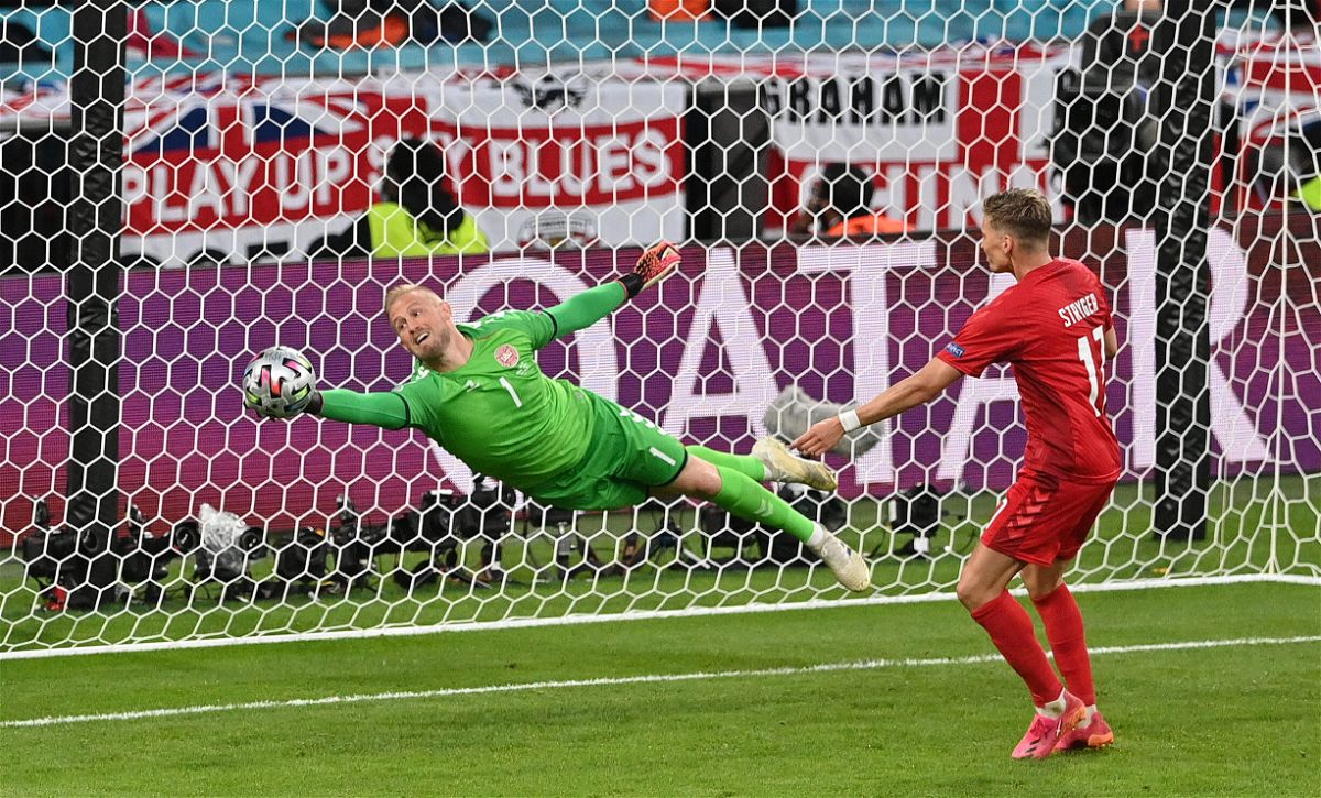 <i>Justin Tallis/Pool/Getty Images</i><br/>Kasper Schmeichel made some impressive saves to keep Denmark in the tie.