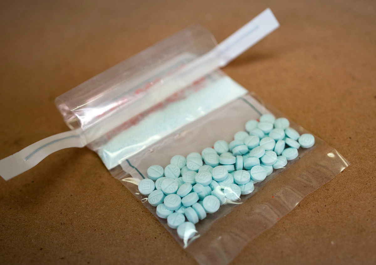 <i>Don Emmert/AFP/Getty Images</i><br />Tablets believed to be laced with fentanyl are displayed at the Drug Enforcement Administration Northeast Regional Laboratory on October 8