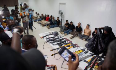 Haiti's police chief described the men presented at the press conference as attackers that have been apprehended.