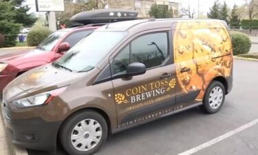 The surveillance video shows a person walking up to the brewery with what looks like a hammer