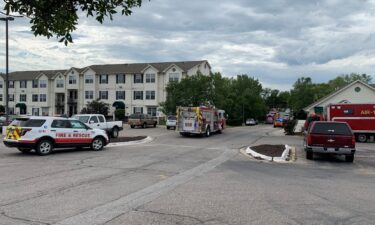 Lincoln Fire and Rescue crews responded to the Bridgeport Apartments after a man who barricaded himself in an apartment to avoid arrest lit a fire in the unit's bathroom