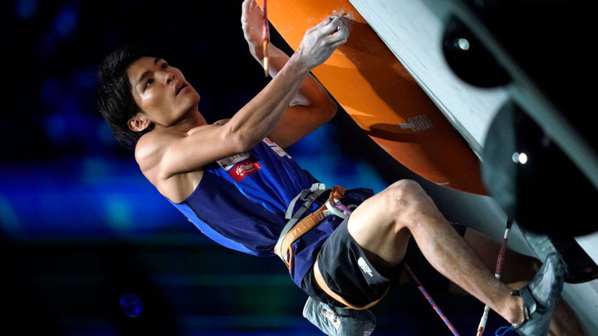Olympic sport climber Tomoa Narasaki of Japan competes in the 2019 Climbing World Championships.