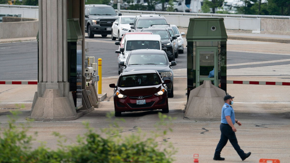 <i>Peter Power/The Canadian Press via AP</i><br/>The US is extending non-essential travel restrictions with Canada and Mexico. Motorists here arrive from the U.S. to Niagara Falls