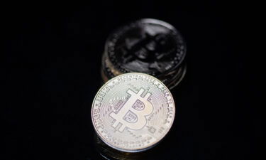 This photograph shows a physical imitation of the Bitcoin cryptocurrency.