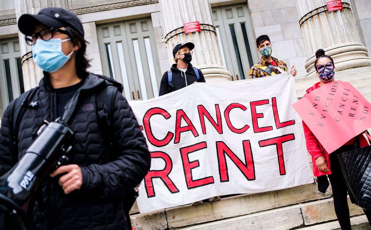 <i>Justin Lane/EPA-EFE/Shutterstock</i><br/>A small group of activists gathers outside of Brooklyn Borough Hall to call for an extension of the state's moratorium on evictions in New York