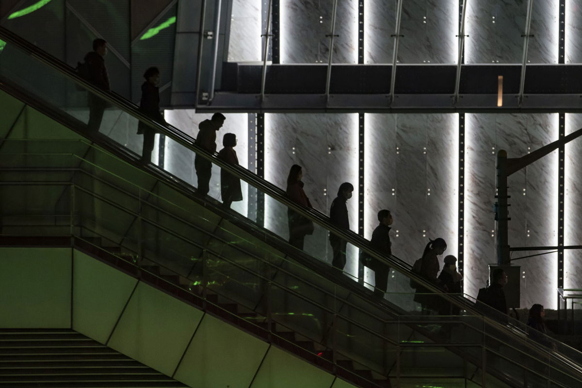 <i>Qilai Shen/Bloomberg/Getty Images</i><br/>China is putting companies that overwork their employees on notice. People are seen here in the Lujiazui financial district in Shanghai