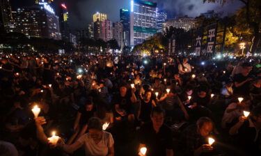 Hong Kong national security police are investigating Tiananmen Square vigil organizers. Attendees here gather at a vigil to commemorate the Tiananmen Square crackdown in Hong Kong on June 4