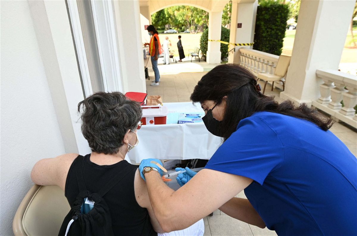 <i>ROBYN BECK/AFP/Getty Images</i><br/>A plan to offer booster doses of Covid-19 vaccine to Americans starting in September adds to the list of pandemic duties in front of the US Food and Drug Administration