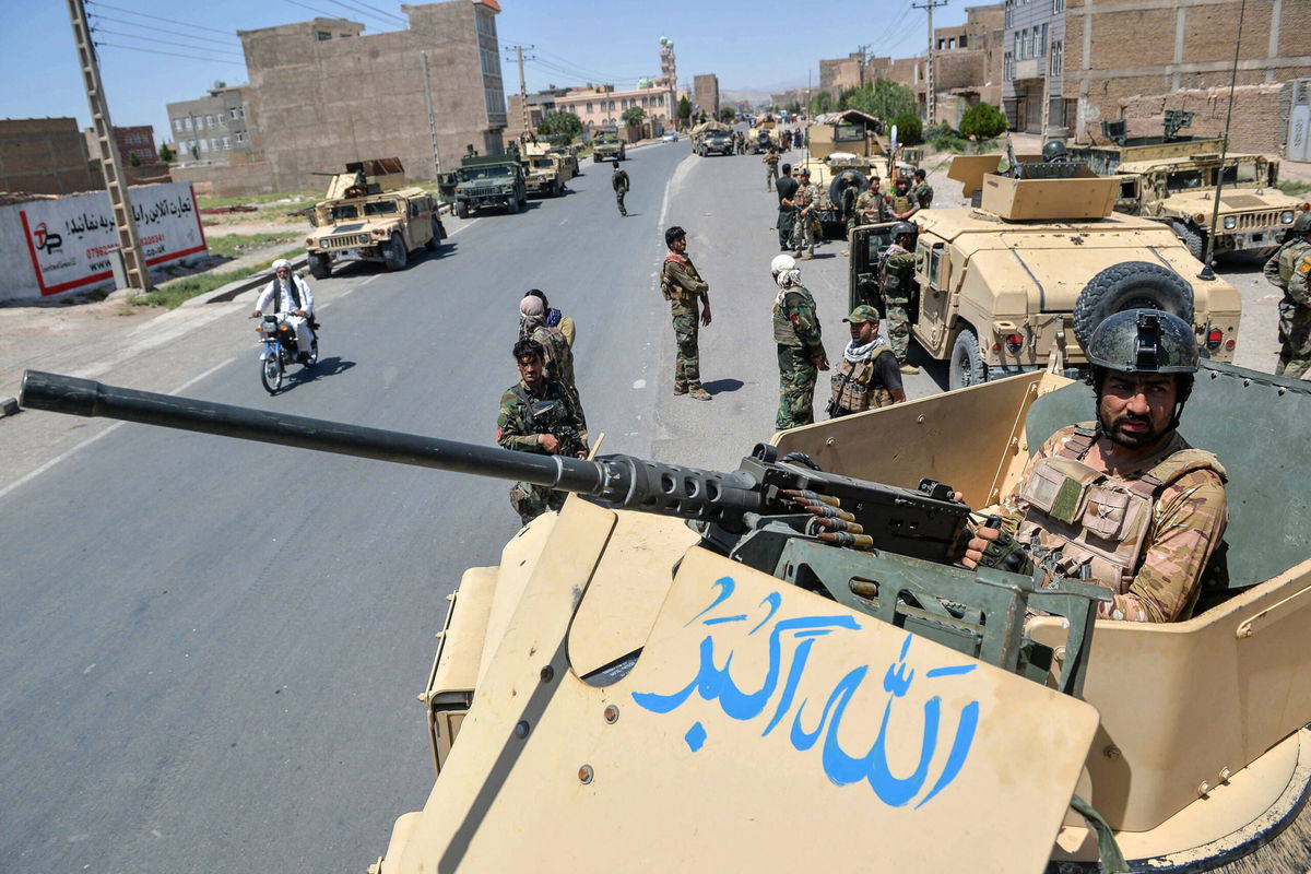 <i>Hoshang Hashimi/AFP/Getty Images</i><br/>US airstrikes pound Taliban positions as militants threaten key cities in Afghanistan. This image shows an Afghan National Army commando in Herat province on August 1.