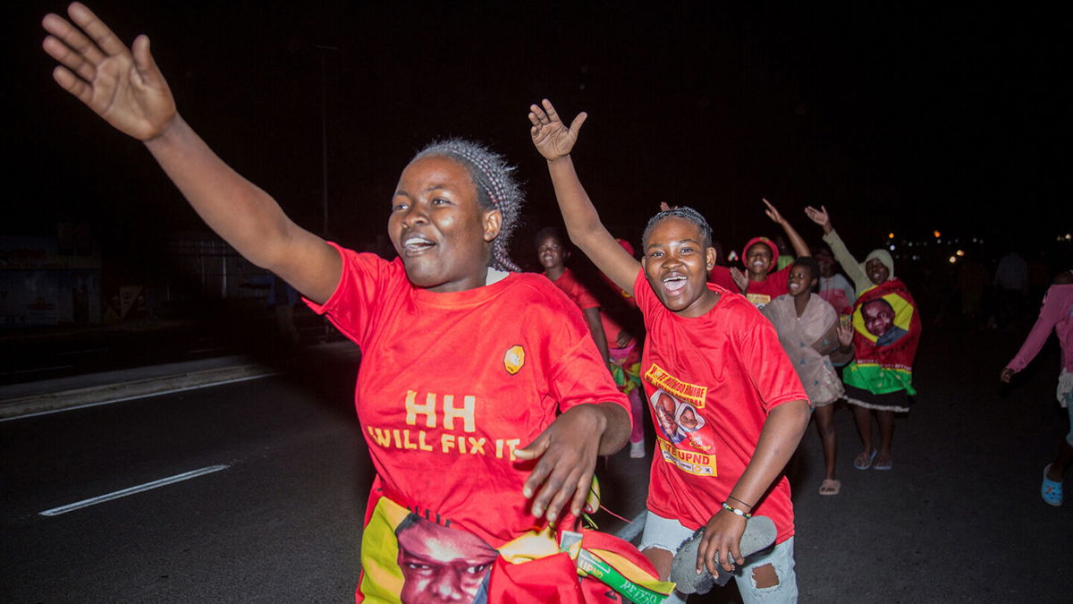 <i>Salim Dawood/AFP/Getty Images</i><br/>Supporters of Zambian president-elect Hakainde Hichilema celebrate his victory