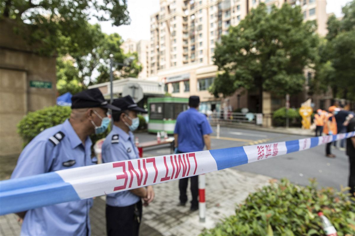 <i>Qilai Shen/Bloomberg/Getty Images</i><br/>Police