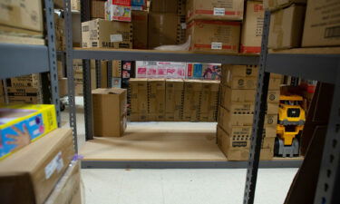 Empty shelves are seen at Mary Arnold Toys on August 2.